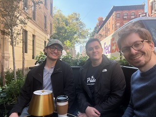 Chris, Grant, and Zack at a cafe