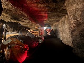 Alex in a mining tunnel exhibit